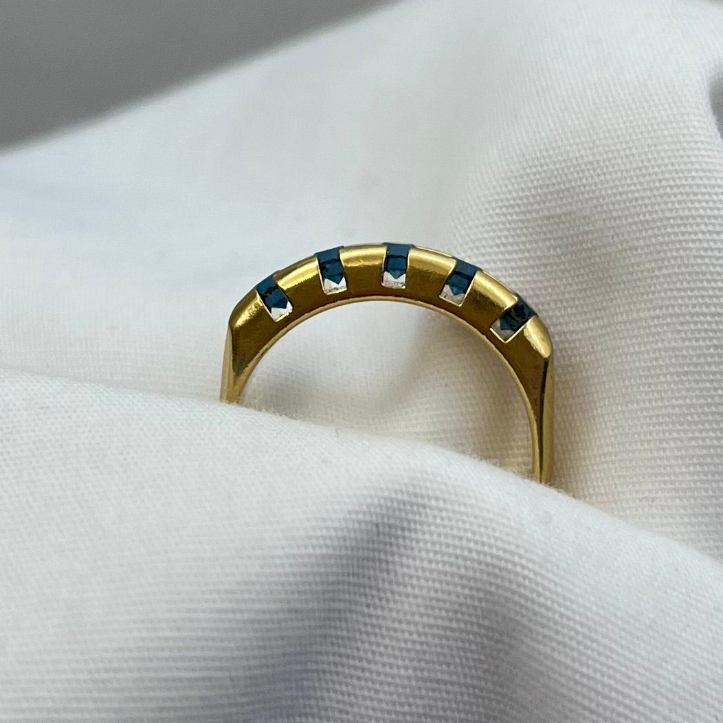Blue Stones in Gold Ring