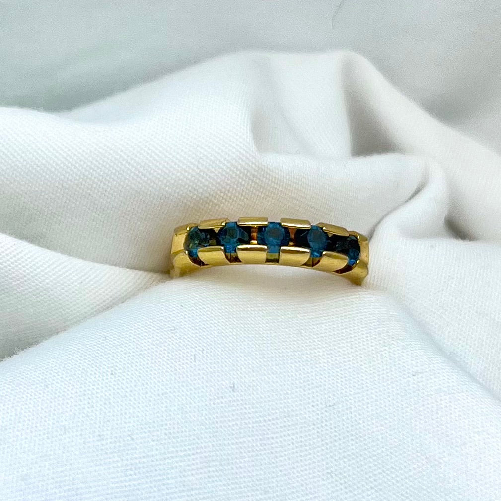 Blue Stones in Gold Ring